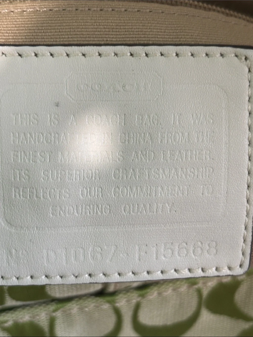vintage Y2K-era Coach Soho Signature Flap Bag (specifically style F15668)